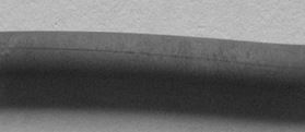 图7-5 ML35钢丝材表面拉痕缺陷